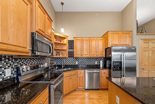 kitchen featuring open shelves, light wood-style flooring, tasteful backsplash, and appliances with stainless steel finishes