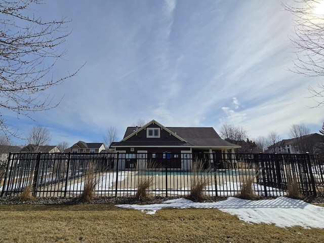 exterior space with a patio area, a community pool, and fence