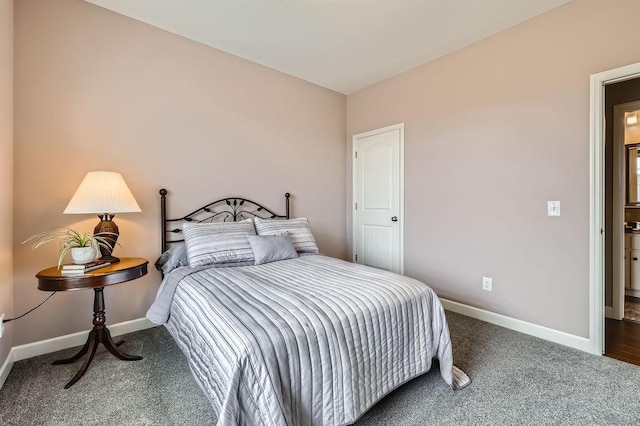 carpeted bedroom with baseboards