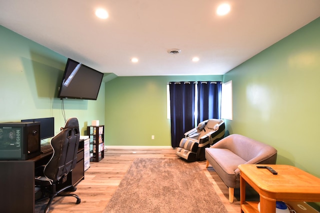 office area featuring light wood finished floors, visible vents, recessed lighting, and baseboards