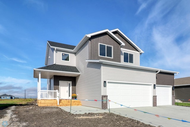 view of front of home featuring a porch, board and batten siding, concrete driveway, roof with shingles, and a garage