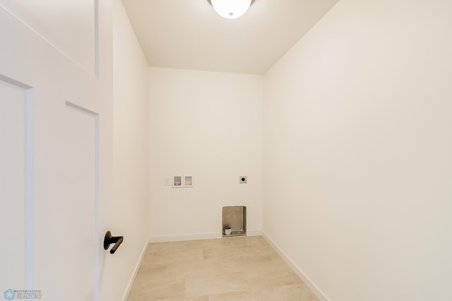 washroom with laundry area, hookup for a washing machine, electric dryer hookup, and baseboards