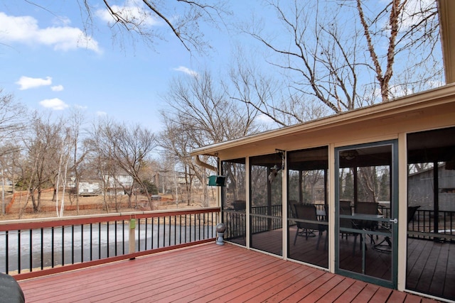 wooden terrace with a sunroom