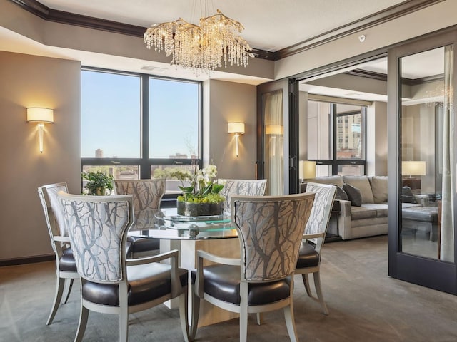 dining room featuring a notable chandelier, carpet floors, visible vents, and ornamental molding