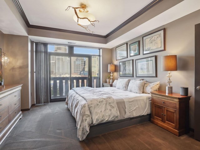 bedroom with visible vents, dark carpet, and ornamental molding