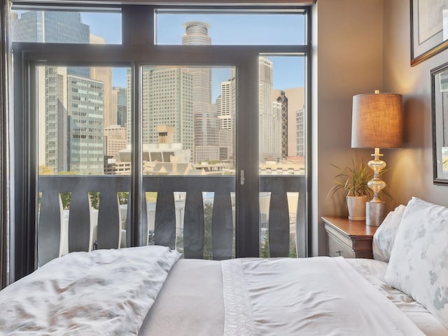 bedroom with a city view