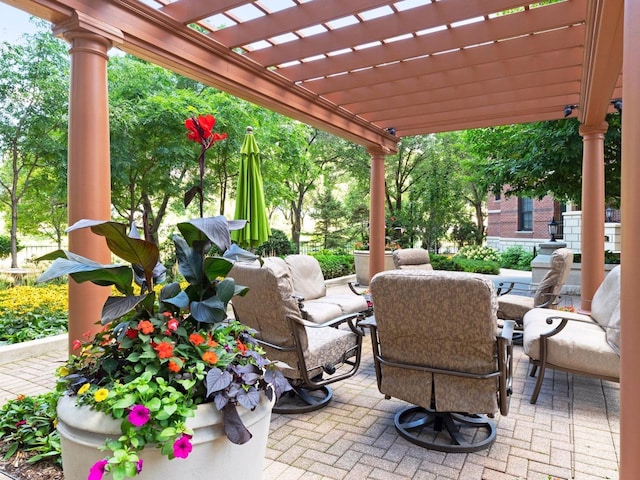 view of patio / terrace featuring outdoor lounge area and a pergola