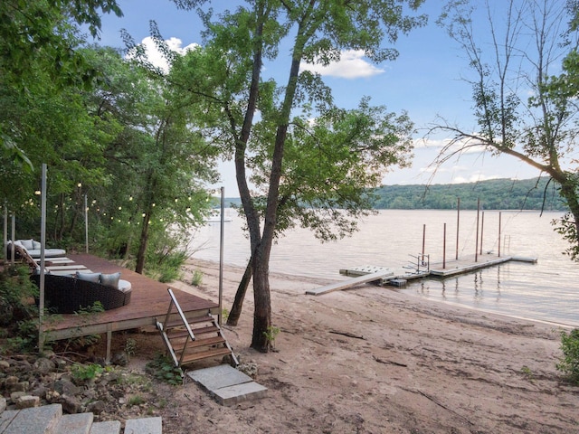 dock area featuring a water view