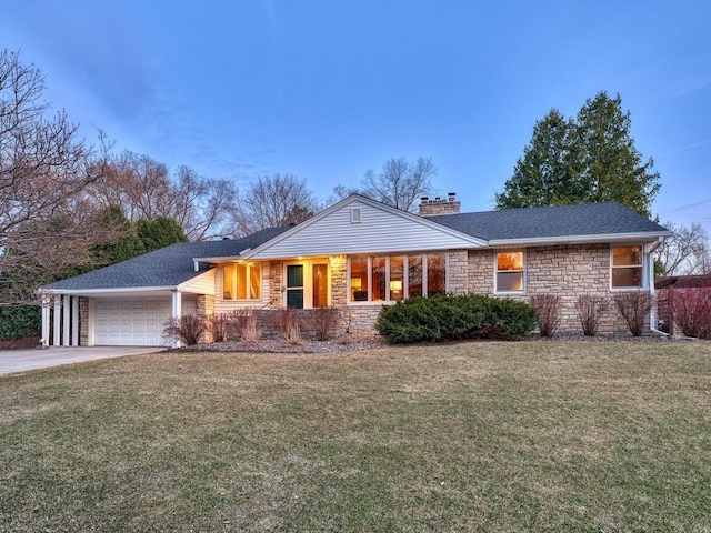 5109 Richmond Dr, Edina, MN 55436 - ranch-style home featuring stone siding, an attached garage, a chimney, a front yard, and concrete driveway