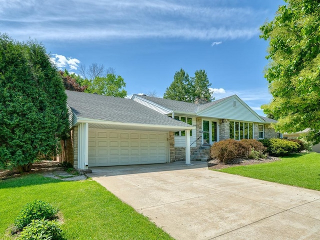 5109 Richmond Dr, Edina, MN 55436 - view of front facade with a garage, a front yard, concrete driveway, a chimney, and stone siding
