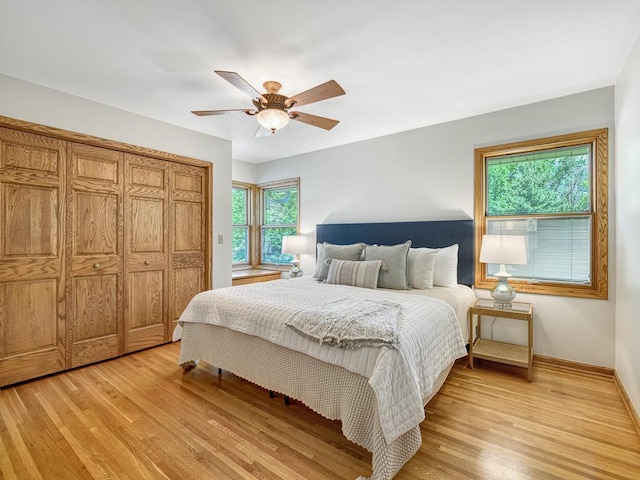 5109 Richmond Dr, Edina, MN 55436 - bedroom with light wood-style flooring, baseboards, a ceiling fan, and a closet