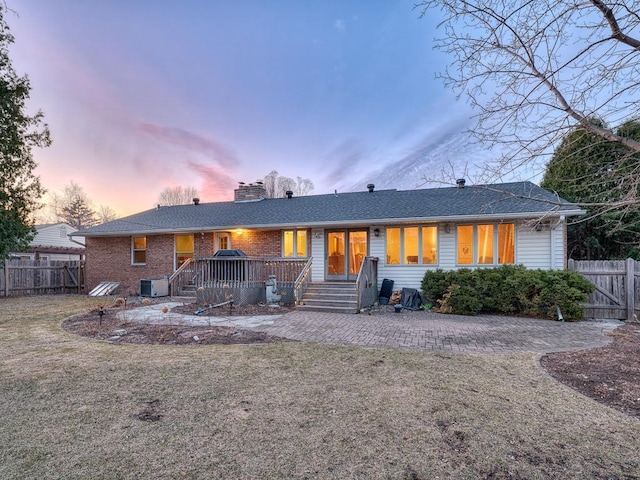 5109 Richmond Dr, Edina, MN 55436 - rear view of property with a chimney and brick siding