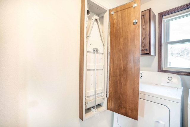 laundry room with cabinet space