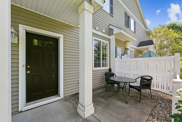 property entrance with fence