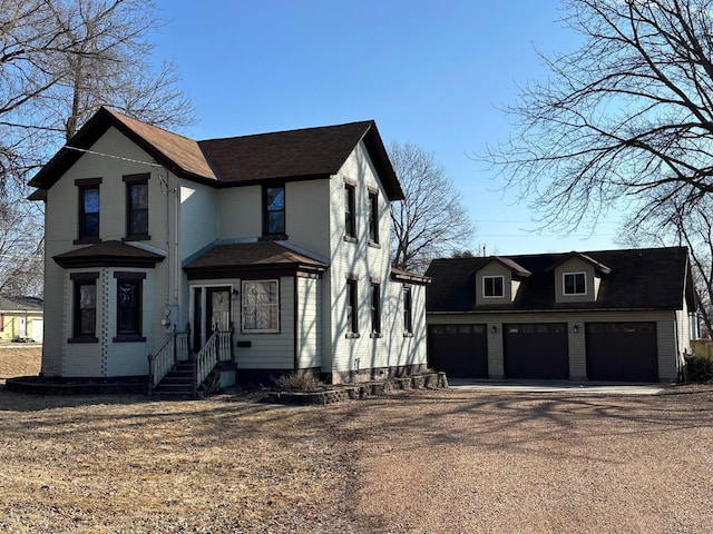 view of front of house featuring a garage and driveway