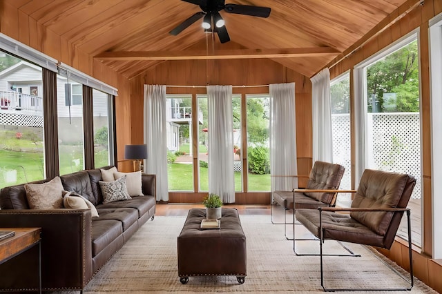 sunroom with wooden ceiling, lofted ceiling, and a ceiling fan