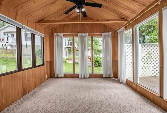 unfurnished sunroom featuring ceiling fan, wooden ceiling, and vaulted ceiling