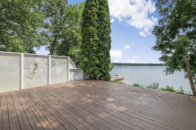 deck featuring a water view