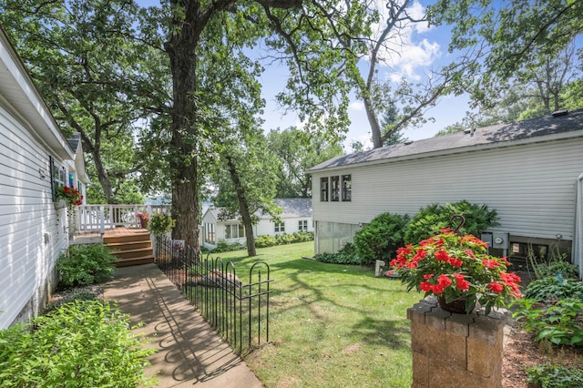 view of yard with a deck