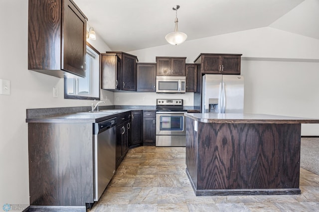 kitchen featuring lofted ceiling, a sink, stainless steel appliances, dark brown cabinets, and a center island