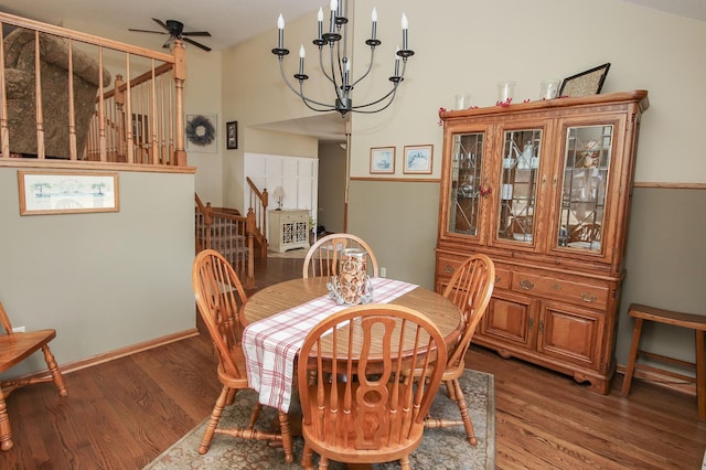 dining space featuring stairway, ceiling fan, baseboards, and light wood-style floors