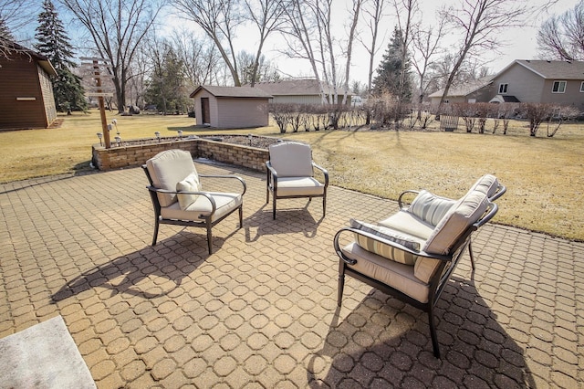 view of patio featuring an outdoor structure