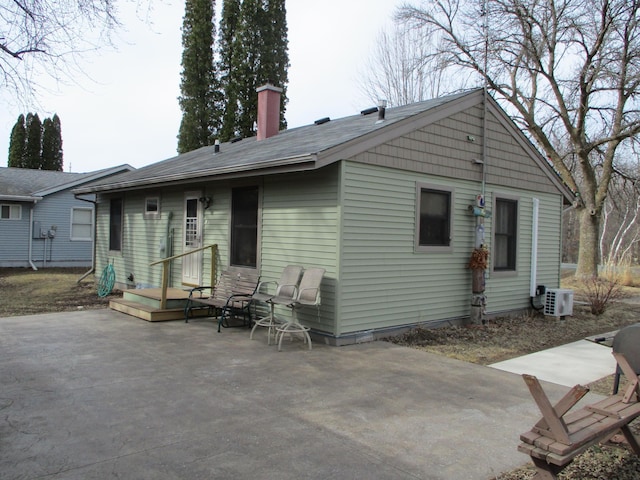 back of property featuring a patio area