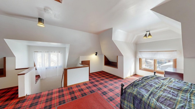 bedroom featuring vaulted ceiling