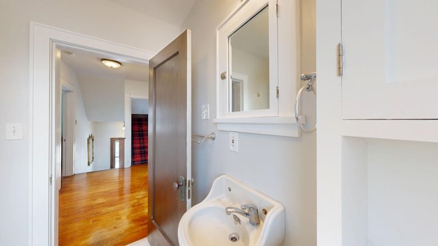 bathroom featuring wood finished floors