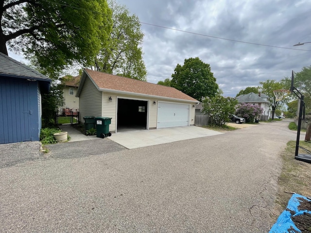 detached garage with fence