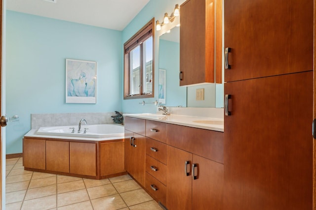 bathroom featuring tile patterned floors, a garden tub, double vanity, and a sink