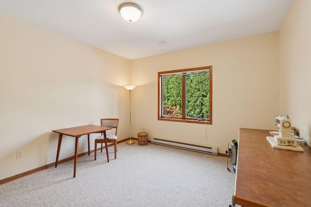 office area featuring a baseboard radiator, light carpet, and baseboards