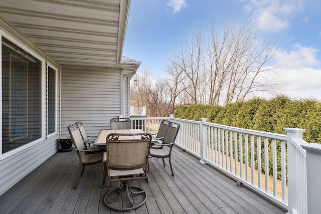 deck with outdoor dining space