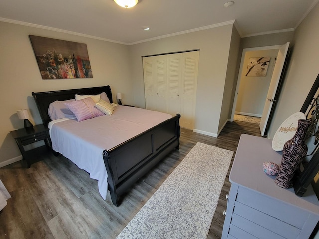 bedroom featuring baseboards, dark wood finished floors, and ornamental molding