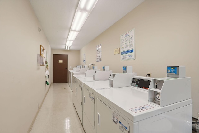 common laundry area featuring independent washer and dryer