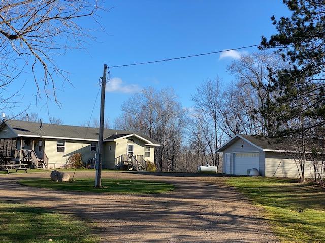 view of road with driveway