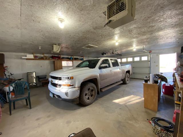 garage featuring a heating unit