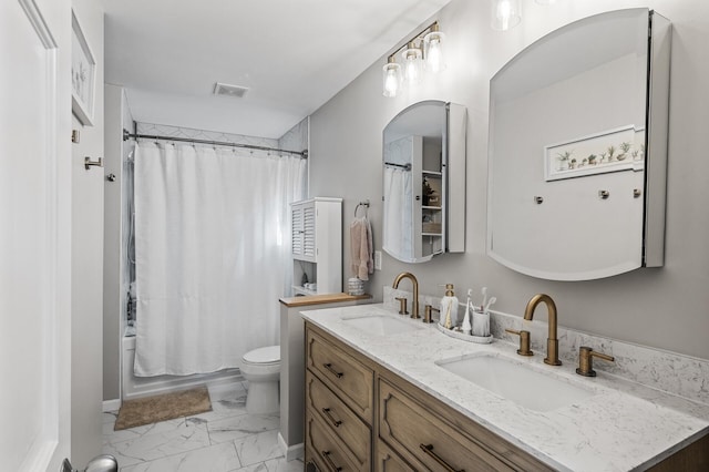 bathroom featuring marble finish floor, visible vents, toilet, and a sink
