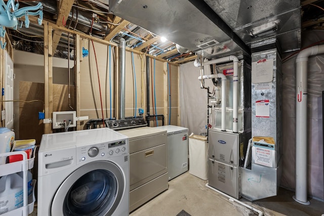 clothes washing area with heating unit, washing machine and clothes dryer, and laundry area