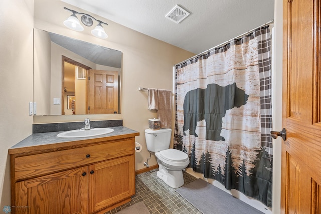 bathroom with vanity, a shower with curtain, visible vents, a textured ceiling, and toilet