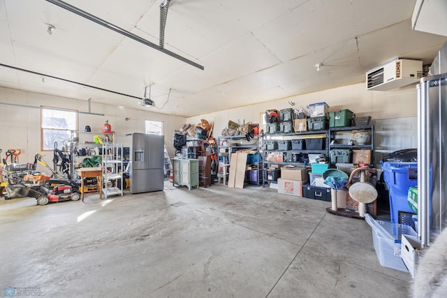 garage with stainless steel fridge