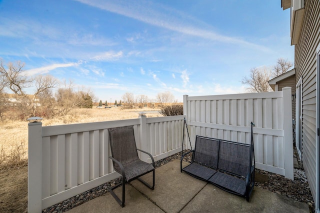 view of patio with fence