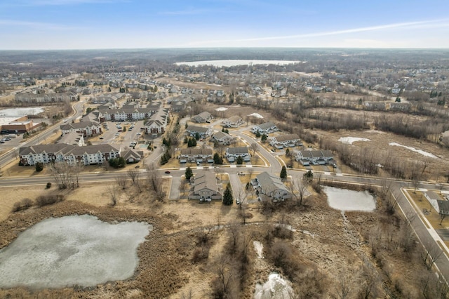 birds eye view of property with a residential view