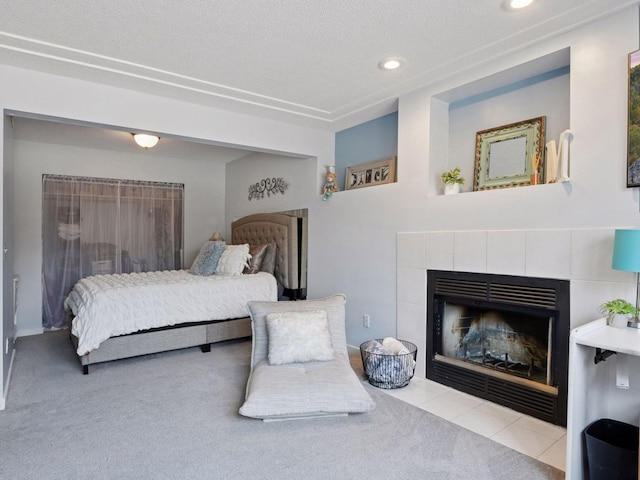 3011 Inverness Ln, Mound, MN 55364 - bedroom with carpet flooring, a fireplace, recessed lighting, and a textured ceiling
