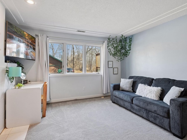 3011 Inverness Ln, Mound, MN 55364 - carpeted living area featuring a textured ceiling, baseboards, and recessed lighting
