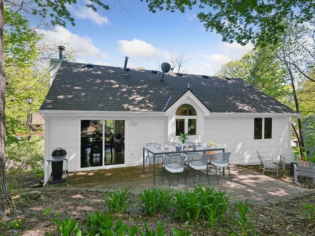 3011 Inverness Ln, Mound, MN 55364 - rear view of property with a shingled roof, a deck, and outdoor dining area