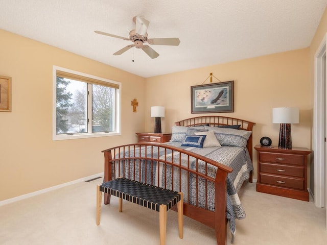 carpeted bedroom featuring visible vents and baseboards