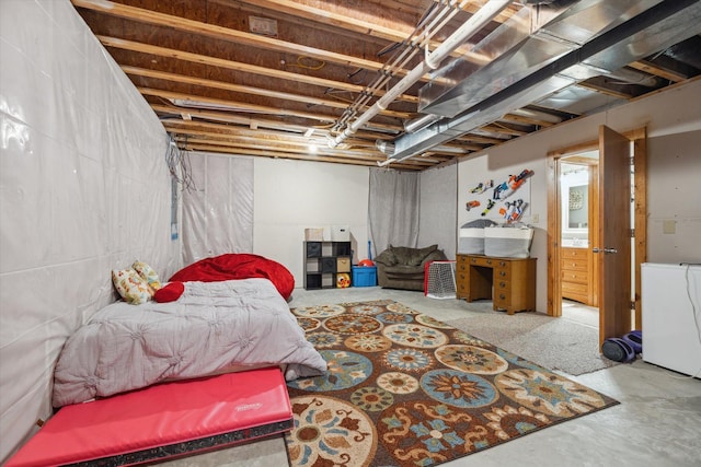 bedroom featuring concrete flooring