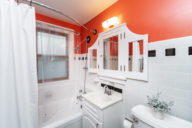 bathroom featuring shower / bath combination with curtain, tile walls, tasteful backsplash, vanity, and toilet