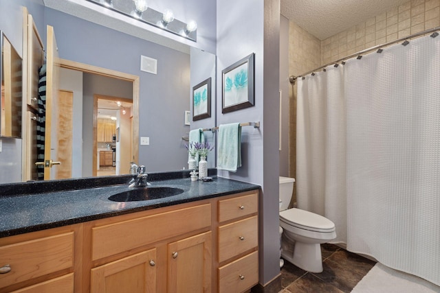 545 1st St Unit 410, Minneapolis, MN 55401 - bathroom featuring a textured ceiling, toilet, a shower with shower curtain, tile patterned floors, and vanity